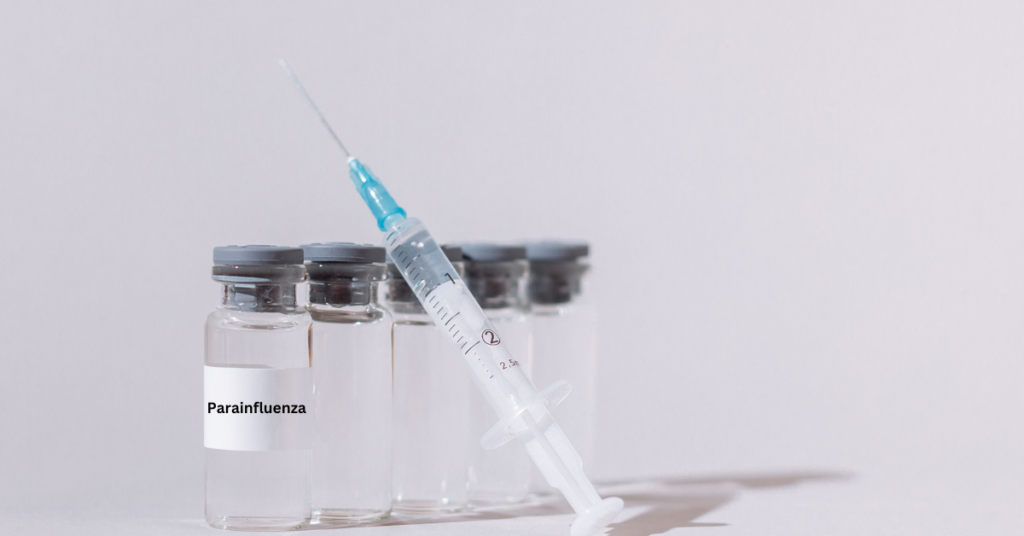 a syringe and vials of parainfluenza vaccine
