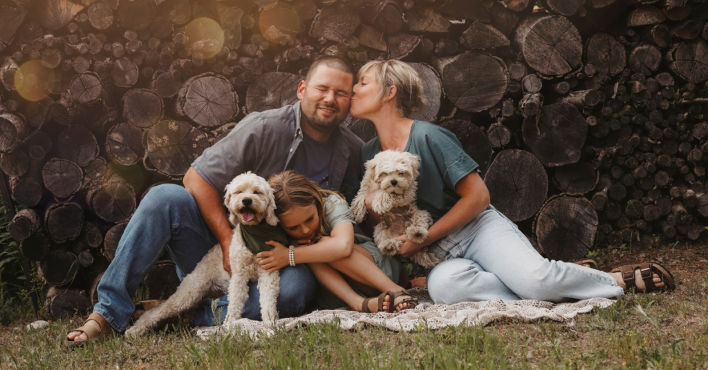 Hypoallergenic dogs, image of Dad, Mom and Girl with 2 hypoallergenic dogs